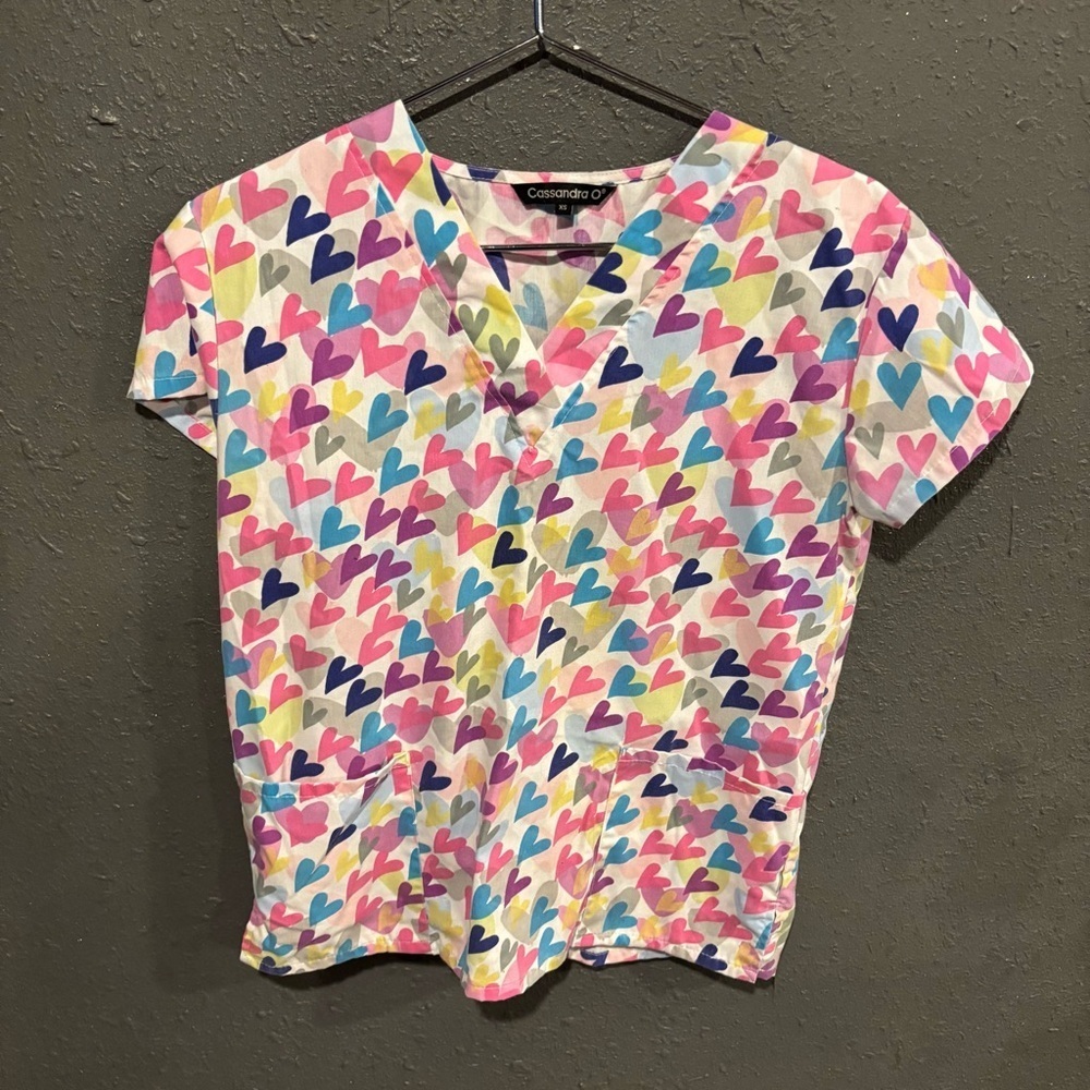 Cassandra O Colorful Heart Print Scrub Top